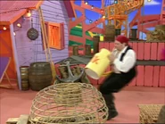 Pirate James holding a crate of Wiggles cow milk