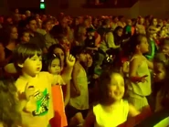 The children of the audience dancing