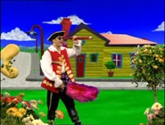 Captain Feathersword looking through telescope