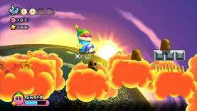 Kirby uses the Spiked Shoe to help cross these orange cloud platforms and defeat the brown Kabus here. Three Metal Blocks can also be seen here. This is in a stage in Nutty Noon.