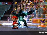 Donkey Kong has touched an Electric Fence and is being shocked while Mario stands still. This is in Mario Strikers Charged.