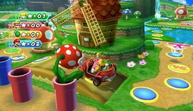 Peach, Wario, Yoshi and Mario pass by a Piranha Plant on Toad Road's map. This is in Mario Party 9.