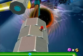 Mario rides these platforms on the first screw of the Chain Chomp Planet.