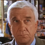 Teniente Frank Drebin en la trilogía de películas de Agáralo como puedas