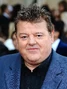 Voz recurrente de Robbie Coltrane.