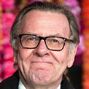Voz recurrente de Tom Wilkinson