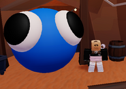 Big Looky next to a Player.