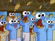 בובספוג זורק את קציצות הסרטן שהכין לתוך הפה של האנשובי הרעבים