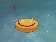 בובספוג שם קטשופ וחרדל על הלחמנייה של קציצת סרטן, ונוצר "פרצוף מחייך"