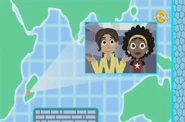 Aviva and Koki on the communicator world map of the Large Screen