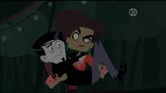Donita holding a scared Zach in her arms