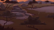 Chris and Martin are walking across the savanna. (far view)