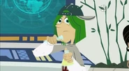 Jimmy's hair has just become green, due to a little accident from Aviva's experiment.