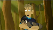 Martin holding an injured Plato
