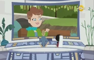 Martin is talking to his mother who is visible on the Large Screen; this is the first and so-far only appearance of her.