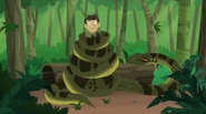 Chris caught in the coils of a Green Anaconda.