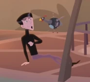 Zach cowering from a bird robot