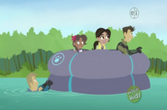 Martin is pushing the Wild Kratts' rubber boat through the river as boat engine.