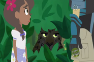 The Wild Kratts aren't noticing the hidden jaguar inside the bushes which is watching them.