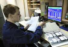 US Navy 110129-N-7676W-152 Culinary Specialist 3rd Class John Smith uses the existing DOS-based food service management system aboard the aircraft 