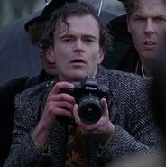 Grant Aldridge as Funeral Photographer