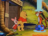Tigger visits Pooh Bear and Piglet with a raining cloud