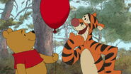 Tigger now has the red balloon as his sidekick