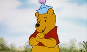 Winnie the Pooh is happy he's in Tigger's story