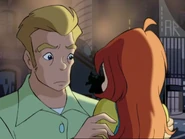 Bloom is wearing her ordinary clothes.