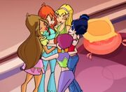 The Winx hugging each other