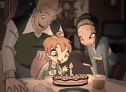 Bloom celebrando un cumpleaños, en su infancia.