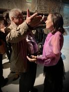 Andrzej Sapkowski hugging Lauren Hissrich at Lucca Comics & Games 2019