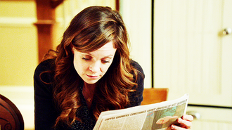 Ingrid reading the newspaper