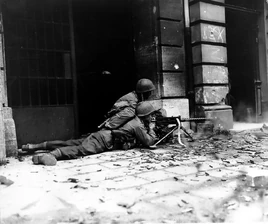 American Browning M1919 machine gun team fighting in Aachen, 15 October 1944