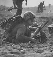 Carbine-equipped Marine on Iwo Jima February 1945