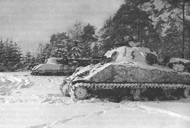 American 7th Armored Division Shermans taking up positions outside St. Vith, 1944