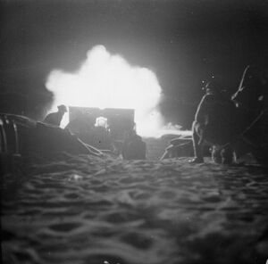 British 25 pounder firing at night, Second Battle of El Alamein, October 23, 1942