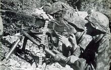 7th SS Volunteer Prinz Eugen Division troops with an MG 37(t)
