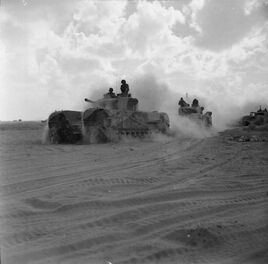 Churchill Mk III tanks of 'King Force' advance during the Second Battle of El Alamein, November 5, 1942