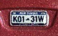 Natalie Certain “New Torque” license plate from her Mini Racers die-cast.