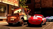 Sara drives alongside Mater.