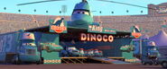 The Dinoco Tent with the members of the team