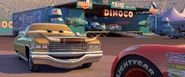 Tex Dinoco offering the Dinoco sponsorship to Lightning McQueen