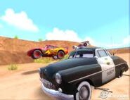 Lightning McQueen racing with Sheriff.