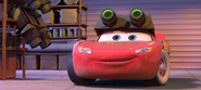 Lightning McQueen using Sarge's night vision goggles.