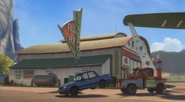 Mater and his tow fair in front of the restaurant