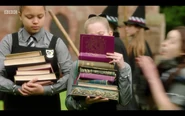 Ethel and Drusilla with piles of books
