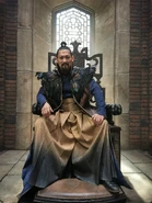 Behind the scenes, Lord Agelmar sitting on the throne. Twitter, June 23, 2022.