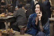 Episode 203: "Selene"; smiling and having a drink in the Foregate.