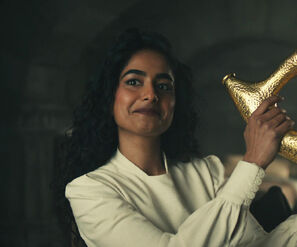 Clara in episode 302, holding the Horn of Valere